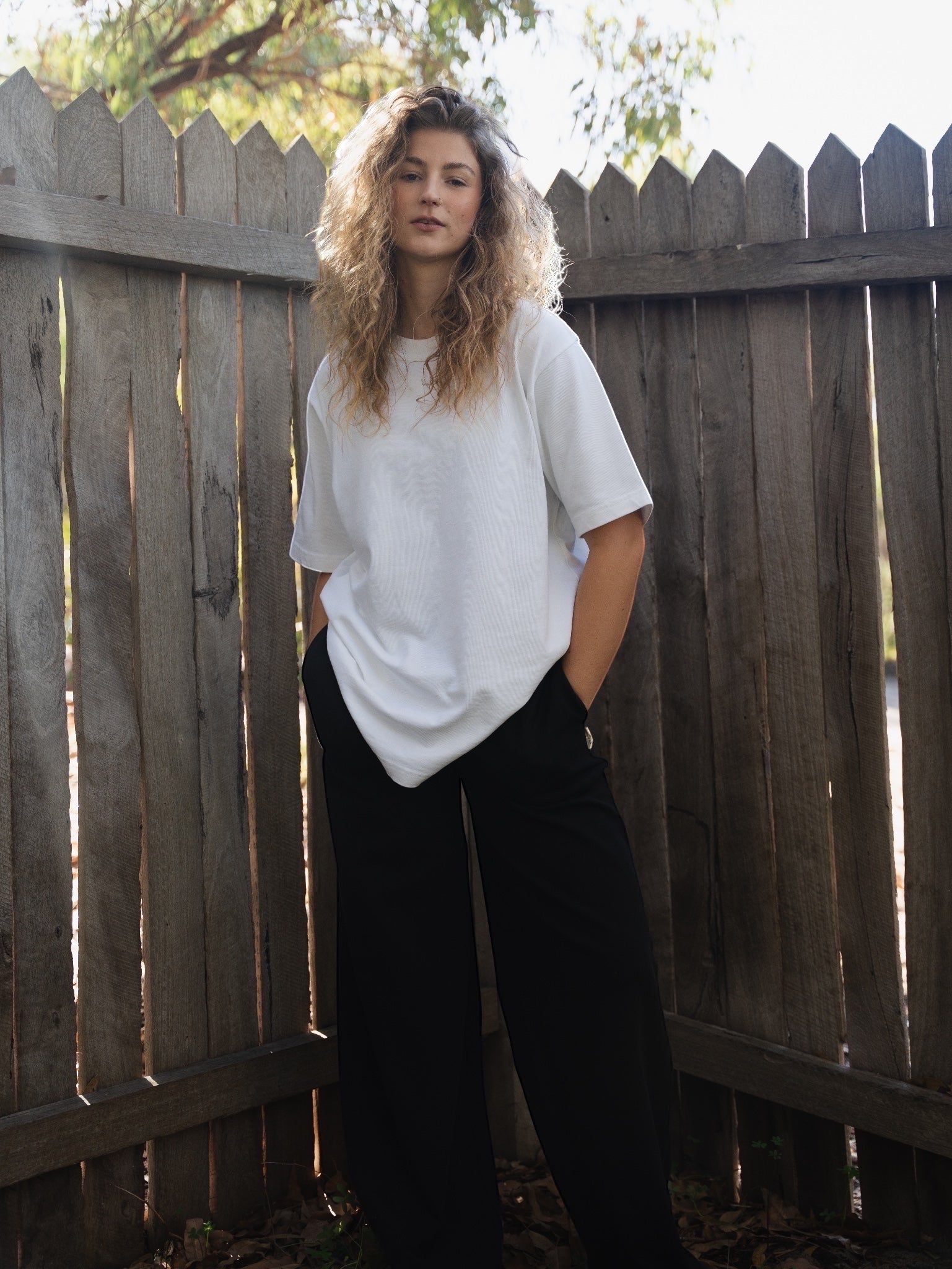 Heavy white t-shirt and black wide leg trackpants