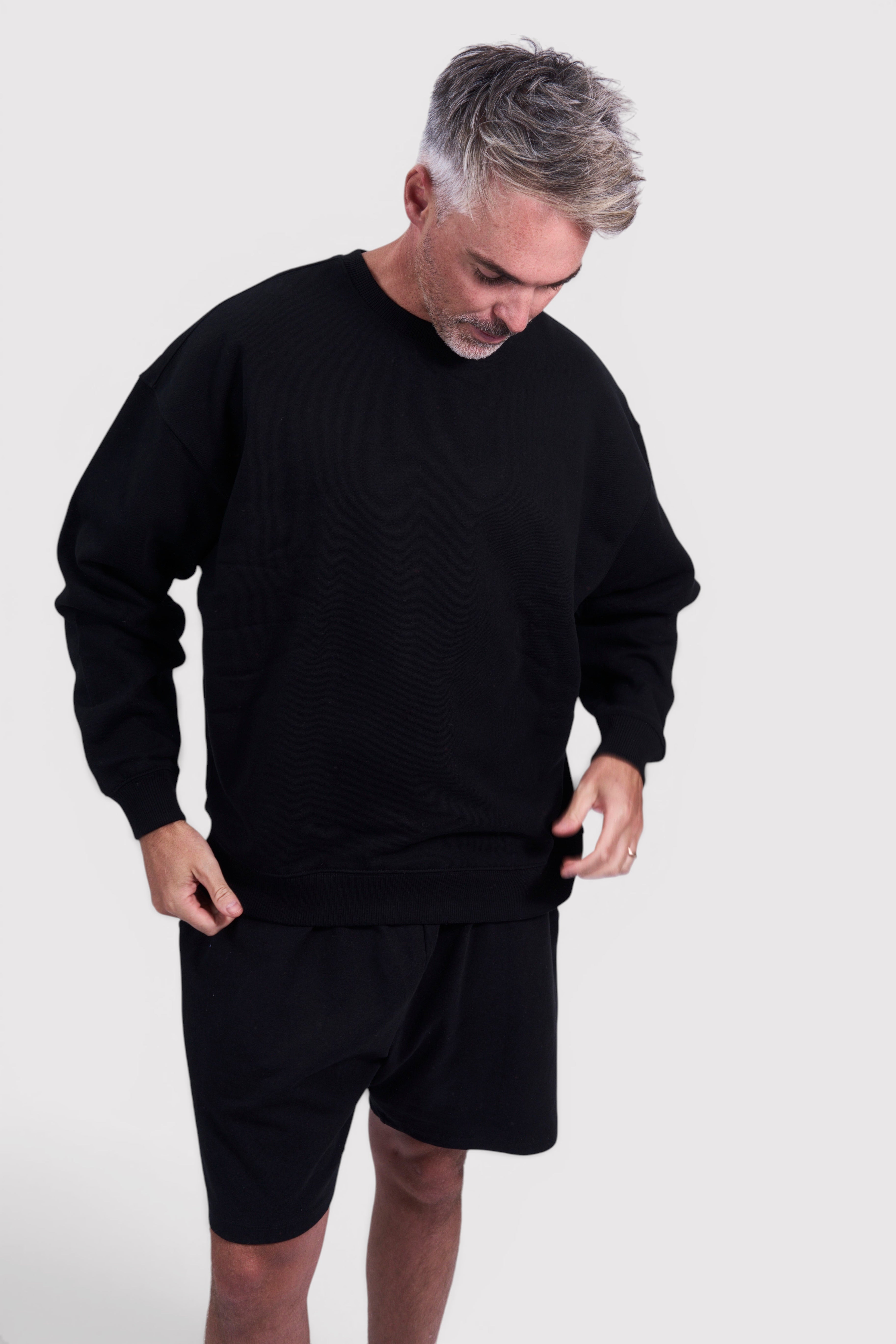 STAPLE Co black oversized crew neck jumper made from brushed organic cotton, 350 GSM heavyweight fabric.
