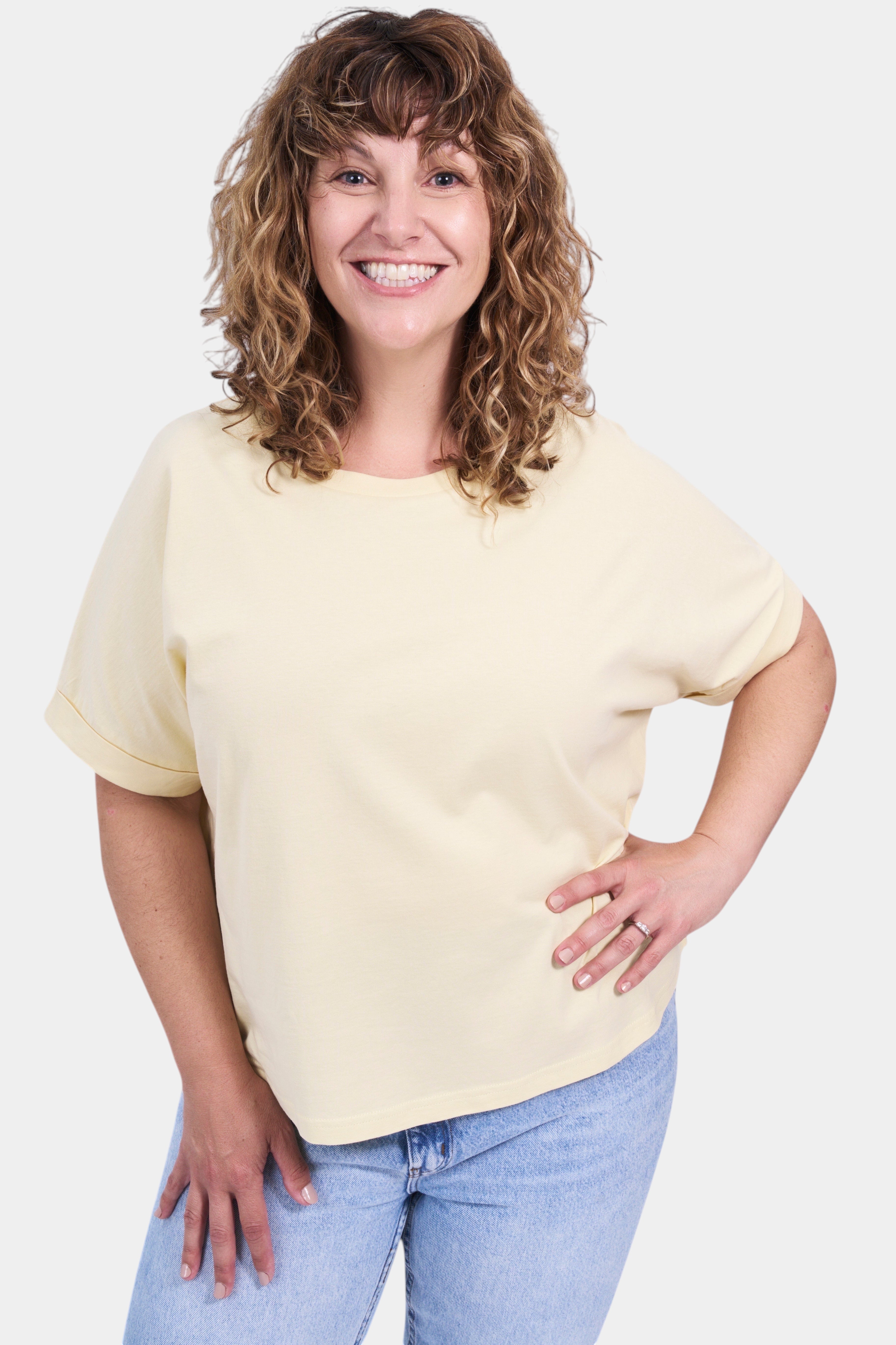 STAPLE Co. light yellow organic cotton boxy t-shirt with rolled sleeves and a relaxed fit.