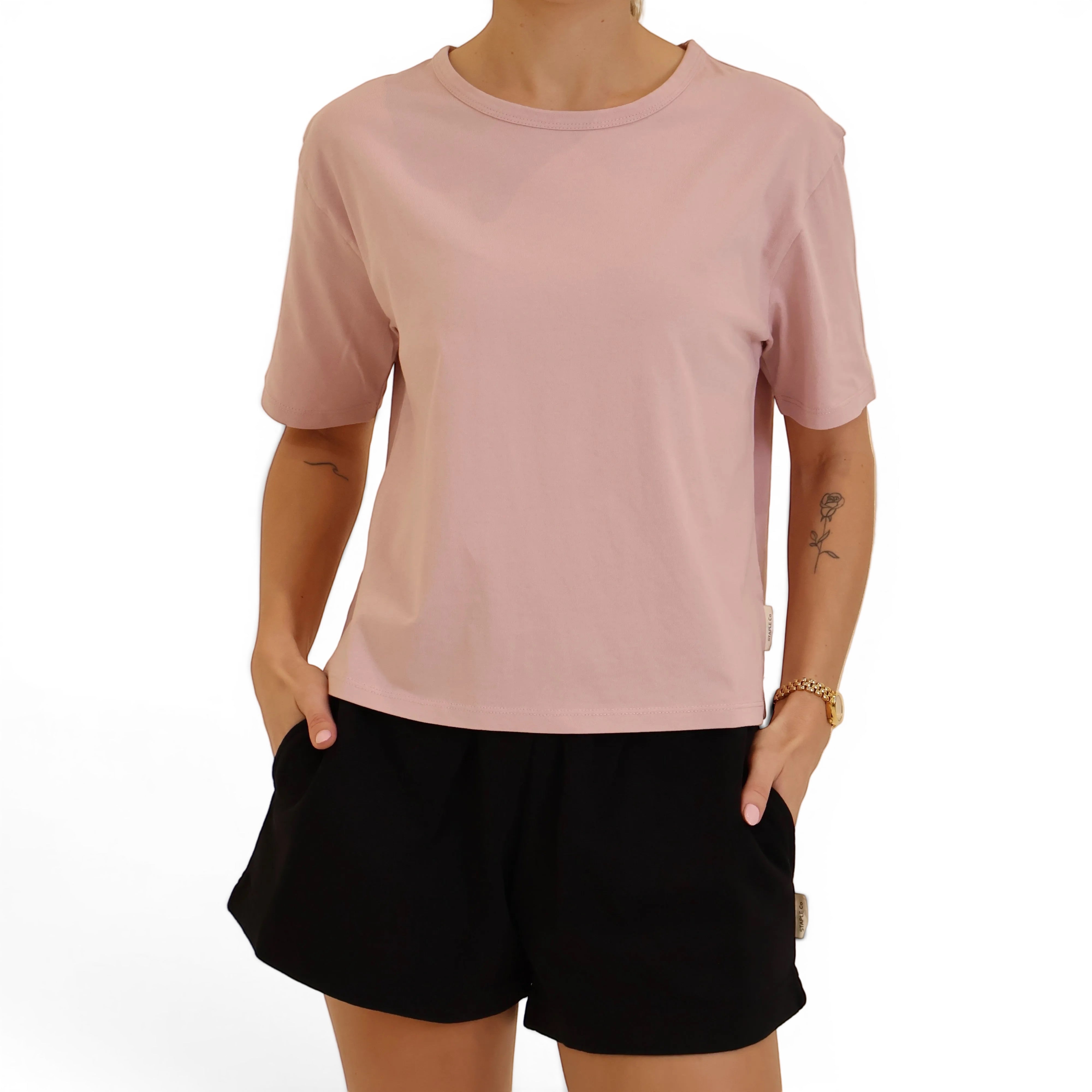 Pink boxy tee with black organic cotton shorts