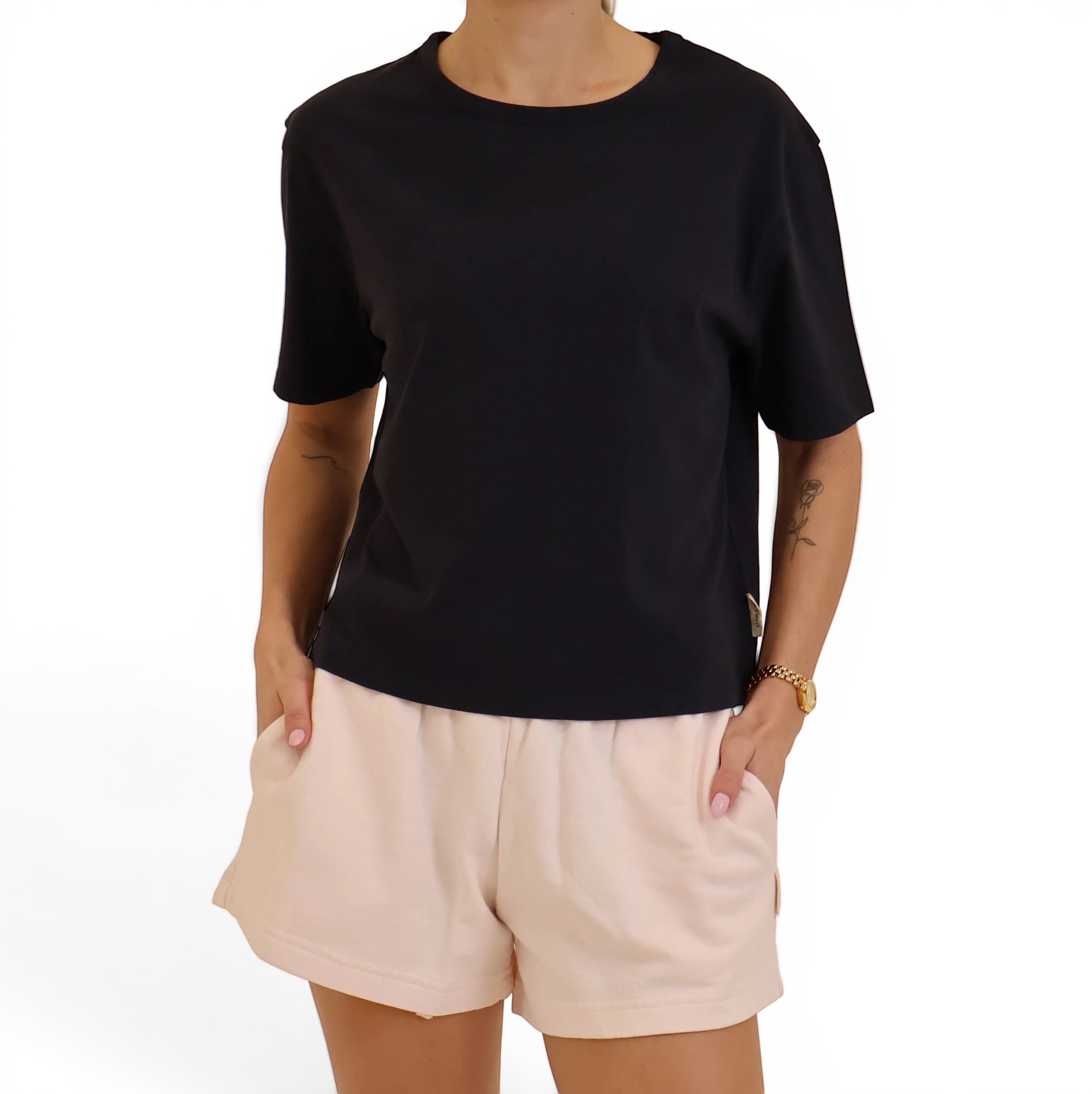 Dark navy boxy tee with pink shorts