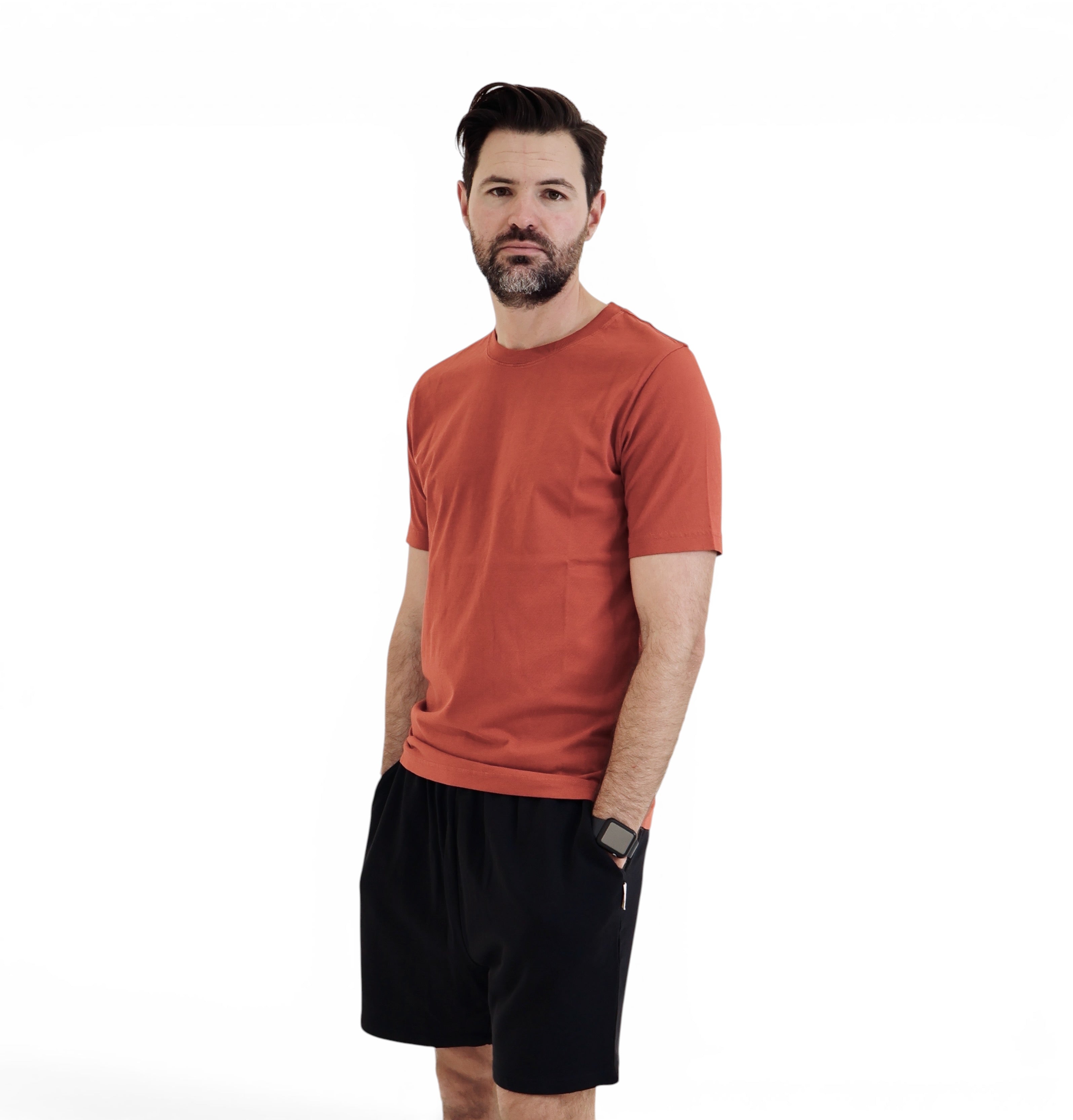 Chilli Red t-shirt and black shorts.