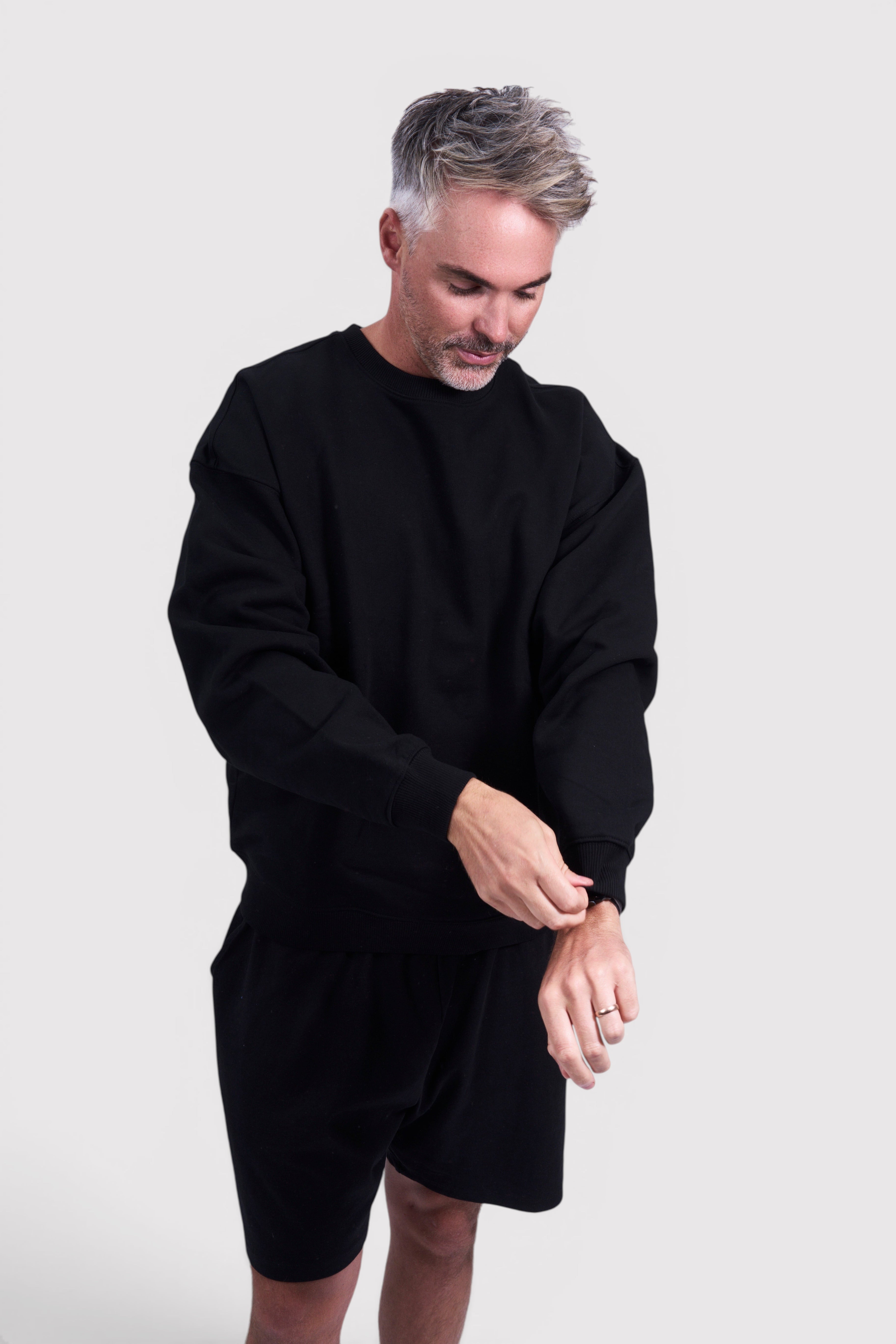 STAPLE Co black oversized crew neck jumper made from 100% brushed organic cotton with a heavyweight feel.